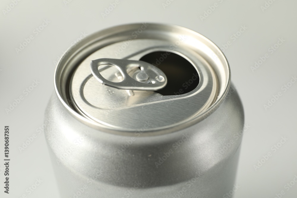 One open tin can on white background, closeup One open tin can on white background, closeup