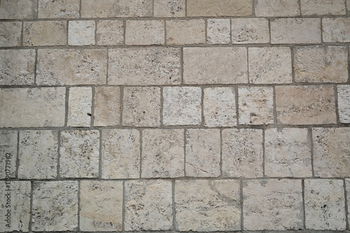 Wallpaper Mural grey stone pavement with rectangular cobblestones in light gray and beige tones. Geometric street texture background Torontodigital.ca