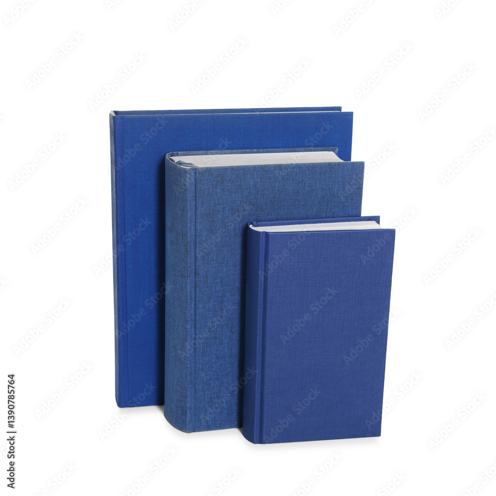 Many blue hardcover books isolated on white