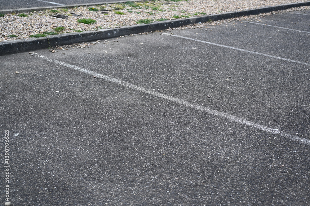 Obraz premium white arrow on gray asphalt, turn left, turn right, abstract white lines on asphalt, background of asphalt texture and white lines 