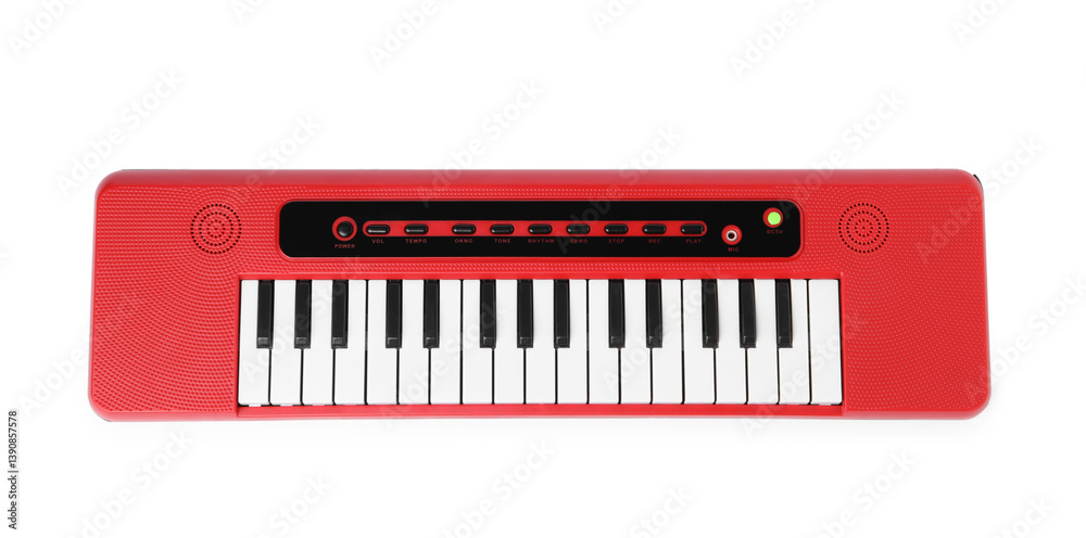 Red toy electric piano isolated on white, top view