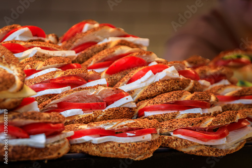 Obraz na płótnie Simit sandwiches with cheese and tomato at a food stall in Istanbul, Turkey w salonie