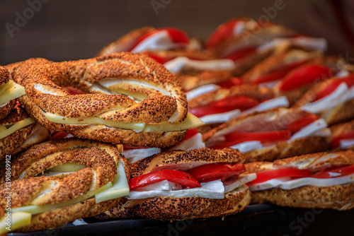 Obraz na płótnie Simit sandwiches with cheese and tomato at a food stall in Istanbul, Turkey w salonie