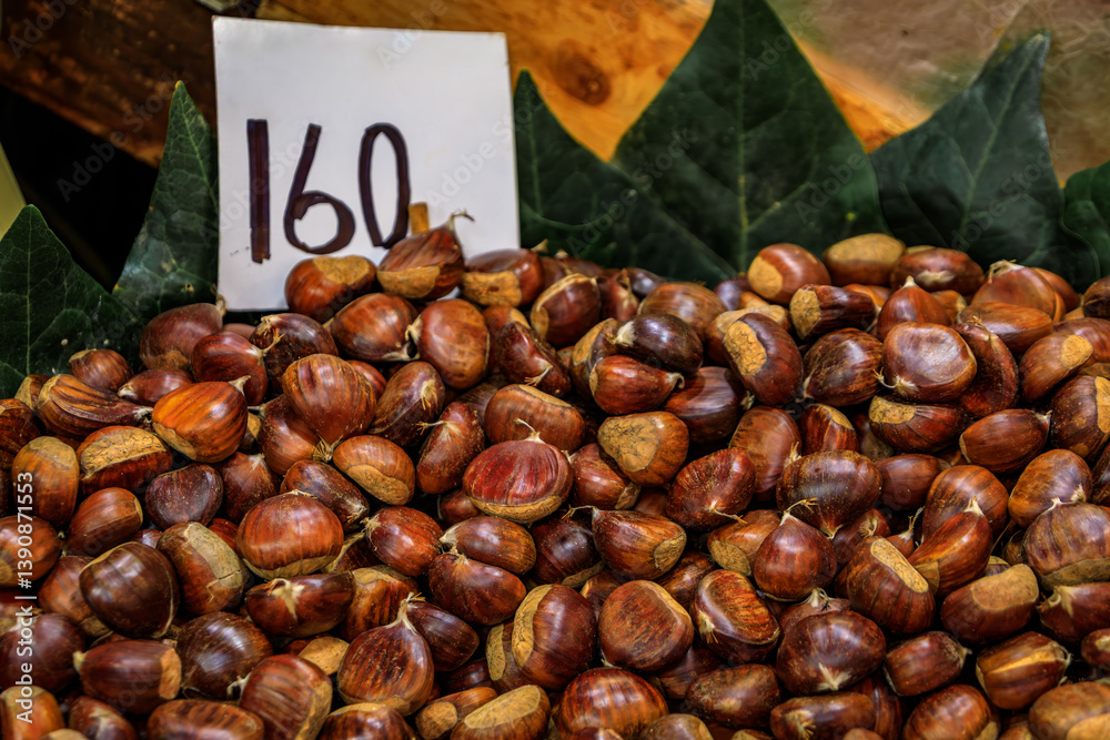 Bulk chestnuts in shell for sale at an Istanbul bazaar market in Istanbul, Turkey