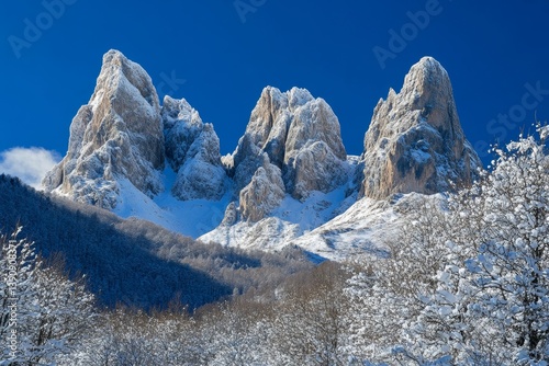 Breathtaking winter landscape in the italian apennines with snow covered peaks and clear sky