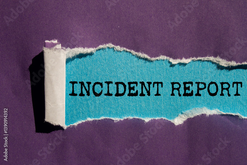 Incident report message written on ripped torn purple paper on blue background. Conceptual incident report symbol. Copy space.