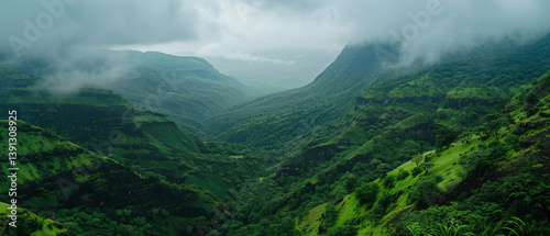 Majestic Green Mountains Under Clouds