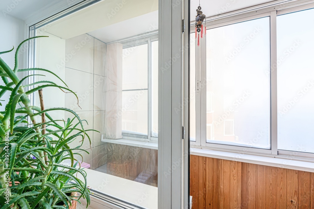 Fototapeta premium interior apartment room balcony overlooking the street, empty space without furniture
