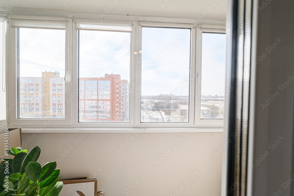 Fototapeta premium interior apartment room balcony overlooking the street, empty space without furniture