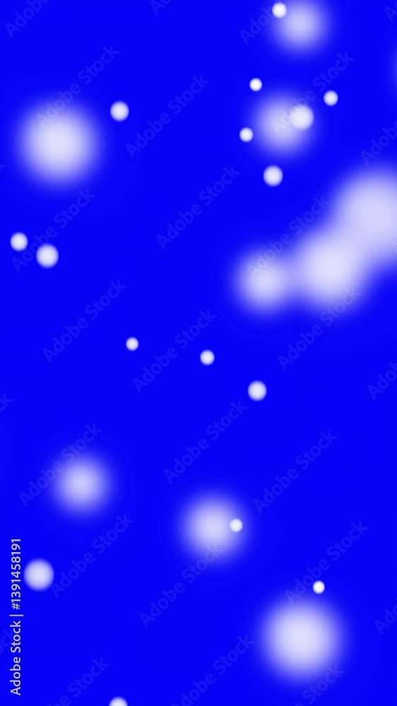 A serene winter scene with blue background and falling snowflakes. Motion A serene winter scene with blue background and falling snowflakes. Motion