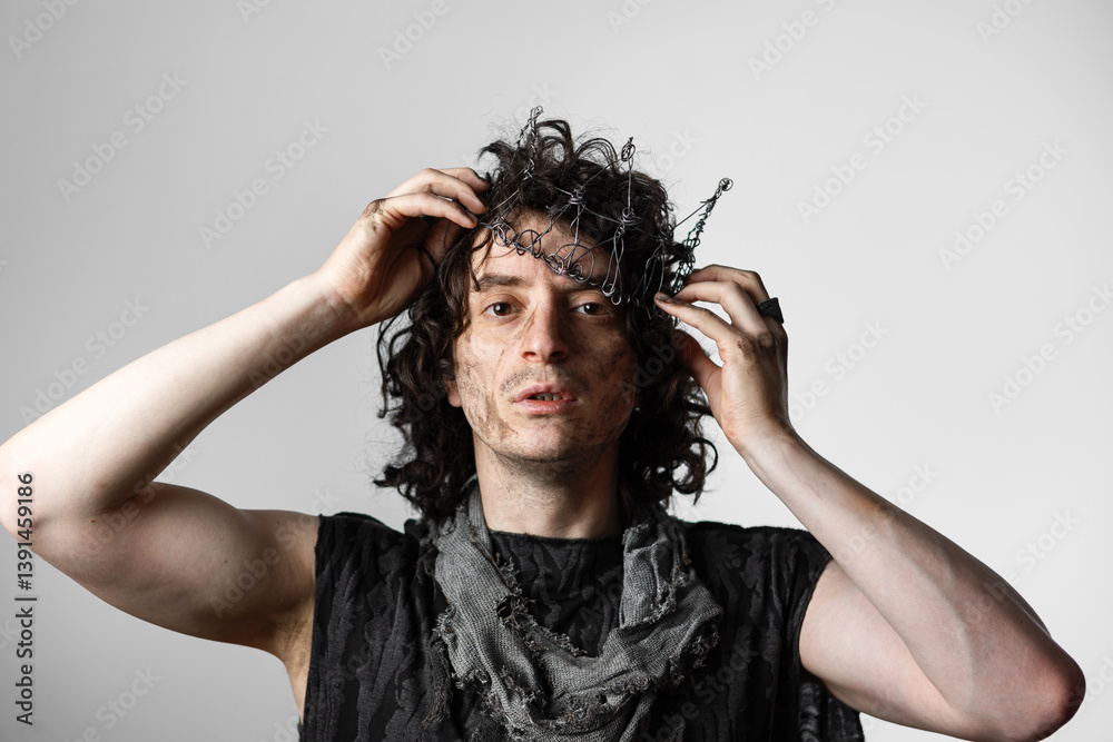 Fotografie Hamlet in modern grunge or post-apocalyptic reinterpretation, young man, tragic