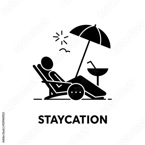 Staycation relaxation under an umbrella with a cocktail  