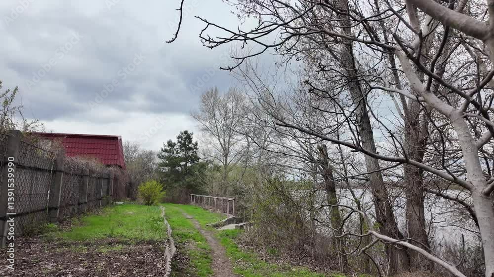 nature walk. path in the grass. slow motion video with spring nature. slow motion video cloudy spring landscape. nature walk. path in the grass. slow motion video with spring nature. slow motion video cloudy spring landscape.