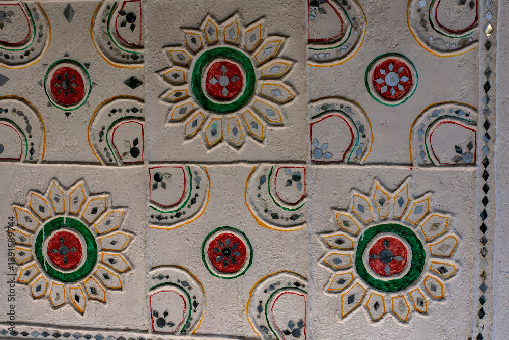 Traditional Folk Art Painting on a Rustic Cottage Wall Showcasing Local Culture