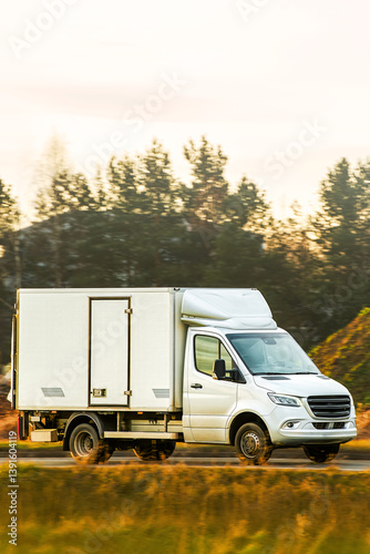 Obraz na płótnie Cargo van moving on countryside road w salonie