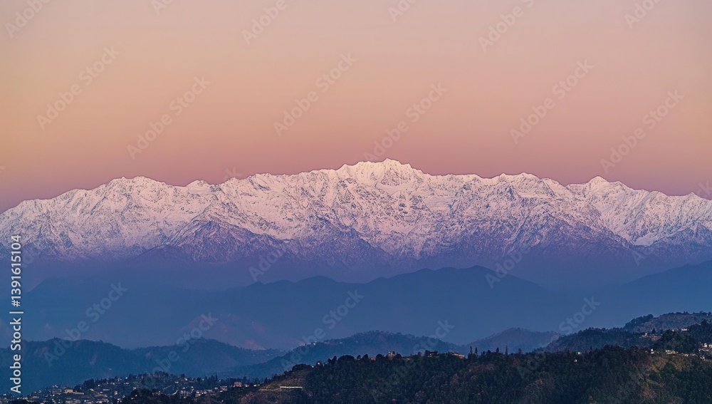 Snowy mountain range at sunrise Snowy mountain range at sunrise