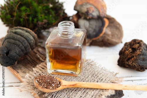 Tincture of birch Chaga mushroom in a glass vial. Traditional medicine.Alternative medicine