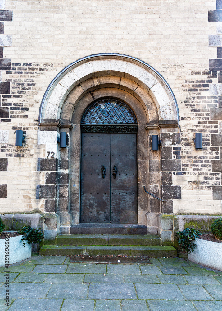 Exterior of old stone and bricks church, Alt St. Martin