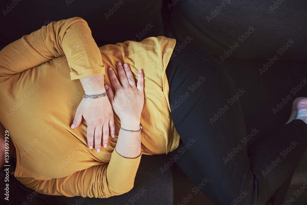 Woman with strong stomach ache, menstrual and digestive issues at home.