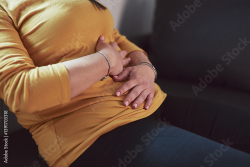 Obraz na płótnie Woman with strong stomach ache, menstrual and digestive issues at home. w salonie