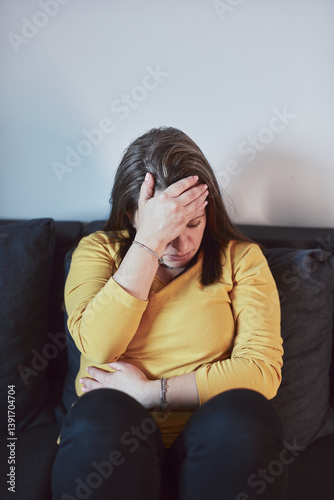 Obraz na płótnie Woman with strong stomach ache, menstrual and digestive issues at home. w salonie