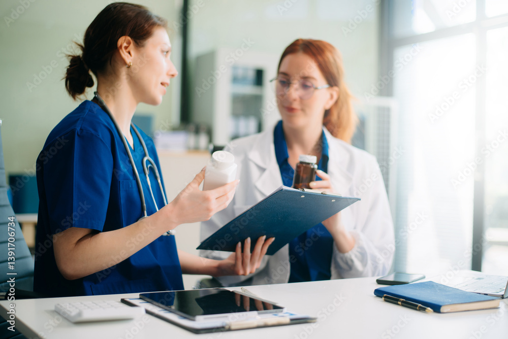 Medical team in hospital using digital tablet for diagnosis, teamwork, and patient care doctor and nurse collaboration Medical team in hospital using digital tablet for diagnosis, teamwork, and patient care doctor and nurse collaboration