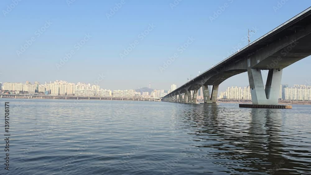 Peaceful Urban Skyline and River Bridge View Peaceful Urban Skyline and River Bridge View