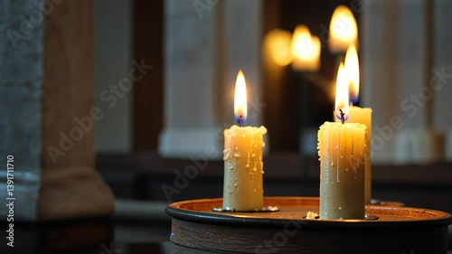 Burning candles in catholic church in the evening candle fire