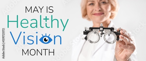 Obraz na płótnie Female ophthalmologist with trial frame on light background, closeup. Healthy Vision Month w salonie