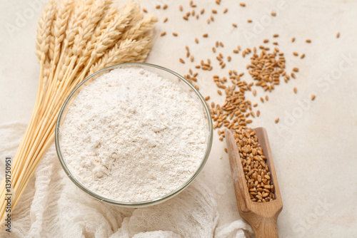 Wheat flour in glass bowl a...