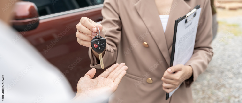 Fototapeta premium lease, rental car, sell, buy. Dealership manager send car keys to the new owner. Sales, loan credit financial, rent vehicle, insurance, renting, Seller, dealer, installment, car care business