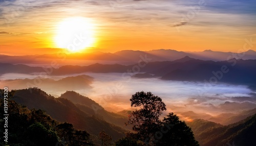 Majestic Sunrise over Misty Mountain Ranges