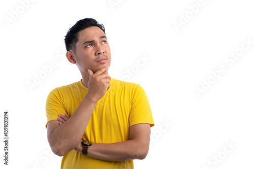 Pensive handsome Asian man with hand touching chin, thinking, making decision, having doubts isolated on transparent background