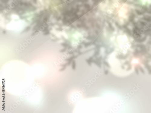 光と木の影が壁に映る美しい背景