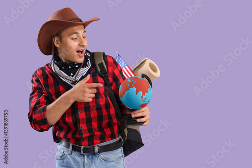 Male tourist in cowboy hat ...