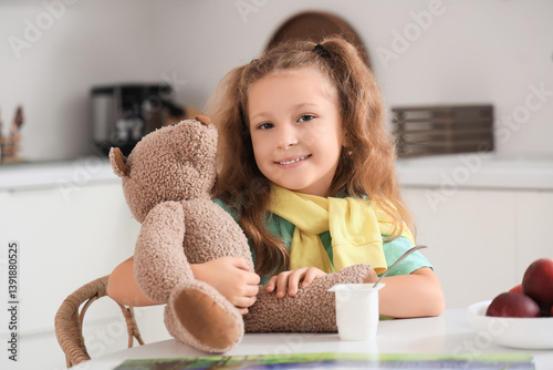 Cute little girl with teddy...
