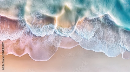 Serene Aerial View of Gentle Ocean Waves Meeting Soft Sand Beach at Sunrise
