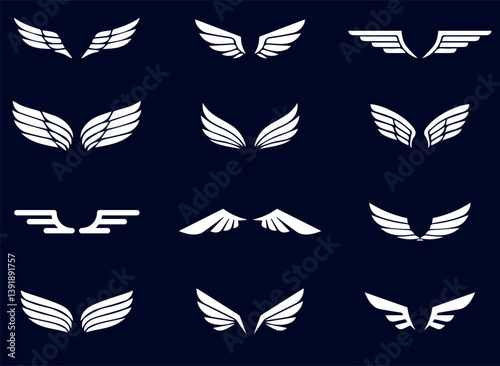 Set of White Wing Logos on Dark Background. A collection of stylized white wing logos on a dark background, featuring various symmetrical and modern designs.