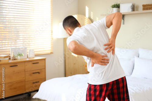 Young man suffering from ba...