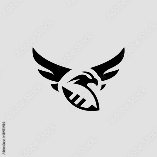 A powerful eagle mascot clutching a football mid-flight, designed in a dynamic and aggressive style for a high school American football team logo