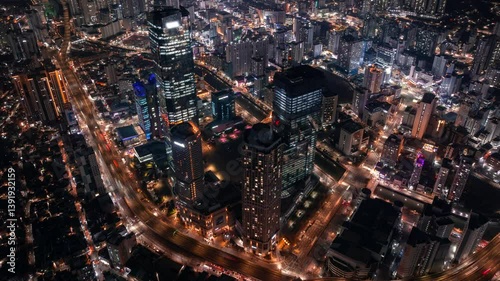 Wallpaper Mural Aerial hyperlapse of skyscrapers and traffic in downtown Busan, Seomyeon district in South Korea at night Torontodigital.ca