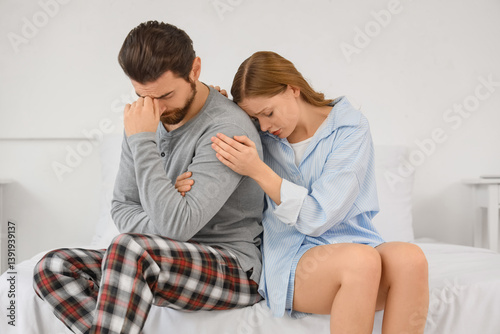 Young woman apologizing to ...