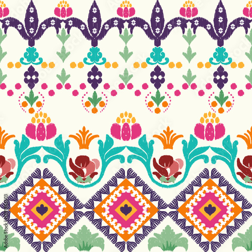 Colorful ikat ethnic floral seamless pattern. Abstract kaleidoscope fabric design texture.
Art of Arabesque. Tribal ethnic texture. Spanish motifs. Aztec style. Indian rug. Gypsy Boho style.