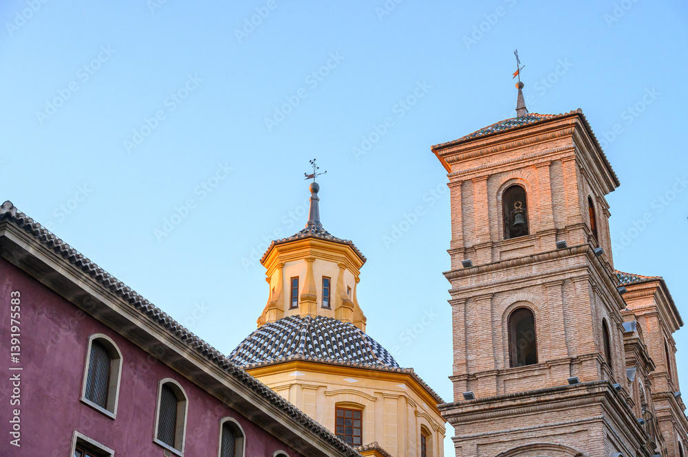 Tiled dome and steeples of the Santo Domingo Church, Murcia, Spain Tiled dome and steeples of the Santo Domingo Church, Murcia, Spain
