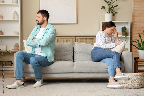 Couple in conflict sitting ...