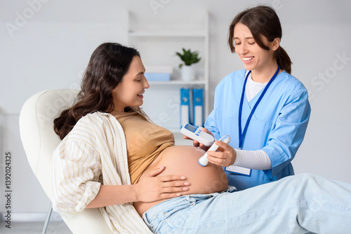 Young pregnant woman and do...