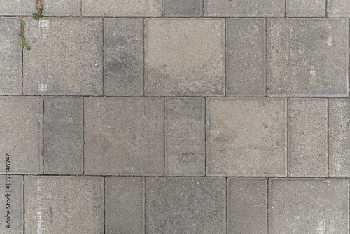 abstract background of old dirty tiles on the road in the park