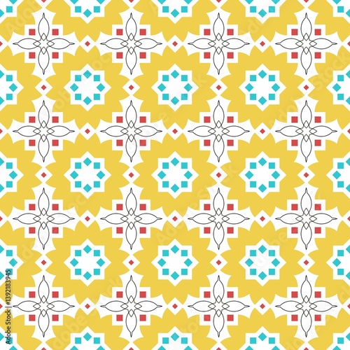 Seamless geometric pattern with yellow, blue, and red shapes creating a vibrant design.