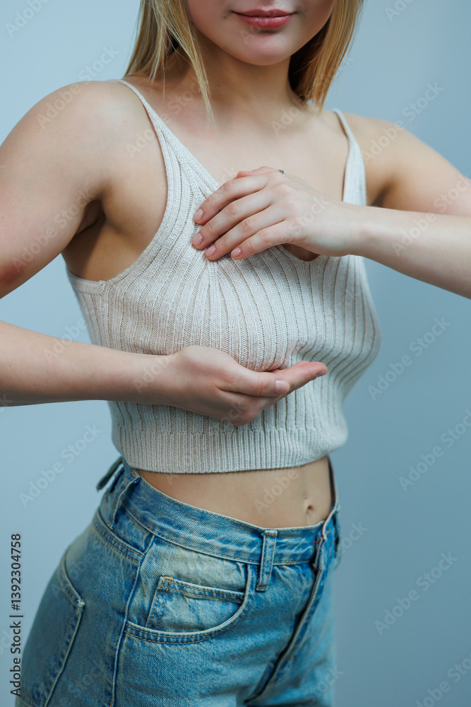 Examination of the mammary gland. A woman at a mammologist's appointment. Women's health care