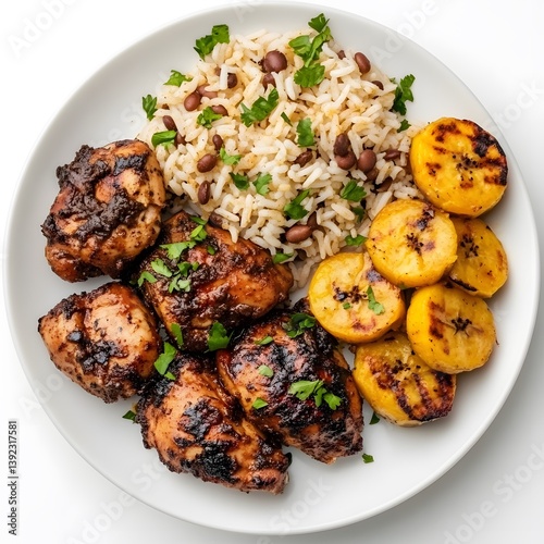 A plate of jerk chicken with rice, beans, and plantains, on a plain white background.